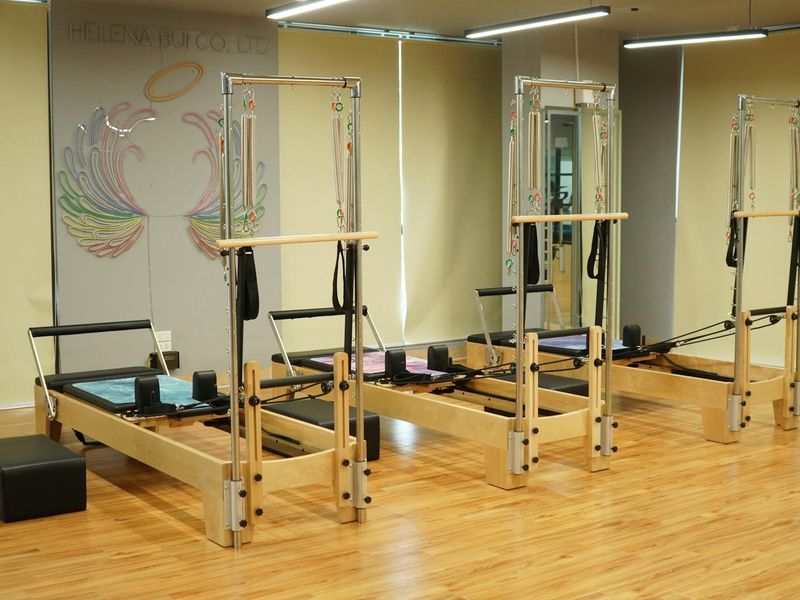 Minimalist fitness equipment on a clean wooden floor background.